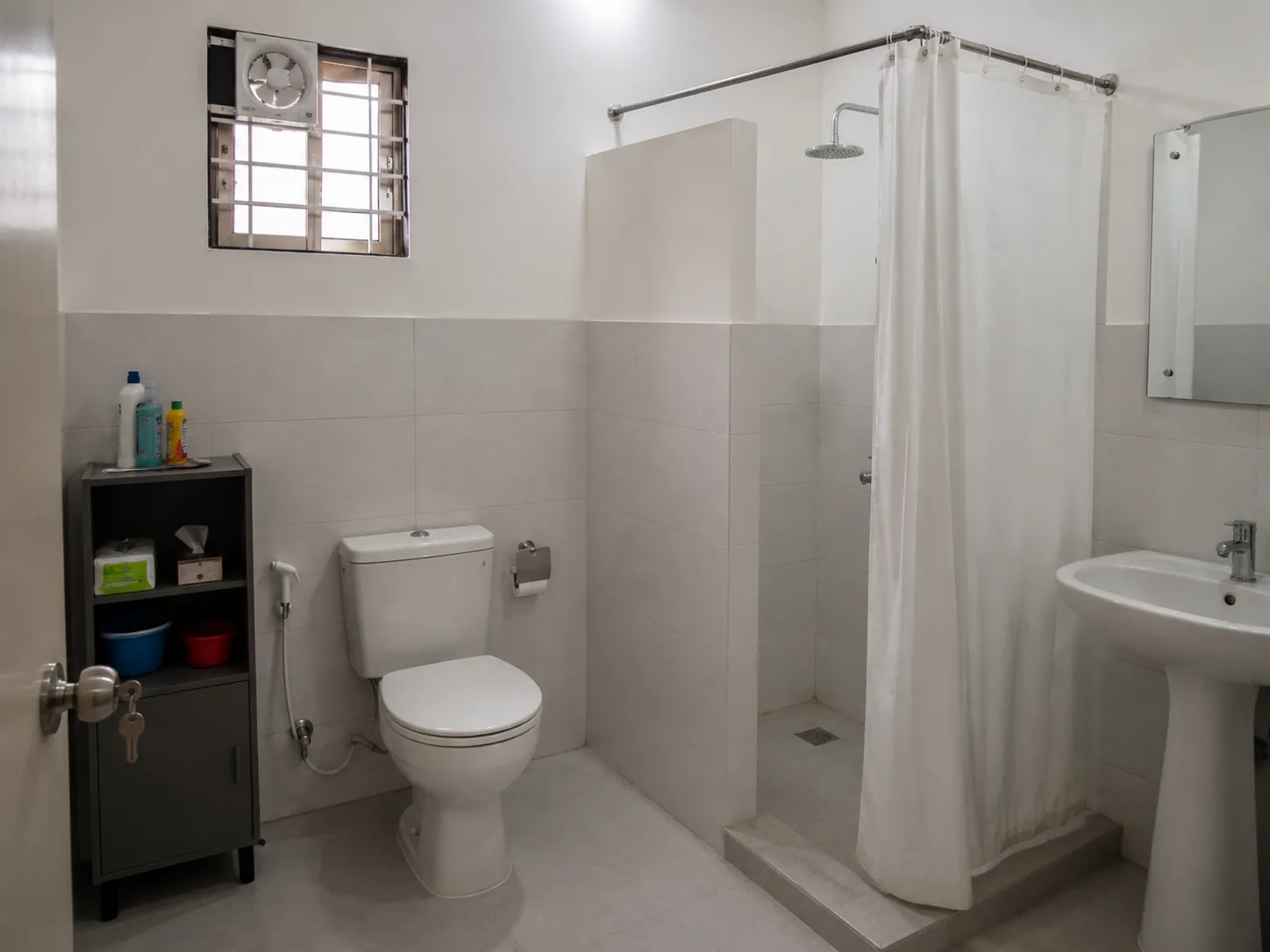 Example photo — a shared bathroom at a shared housing facility