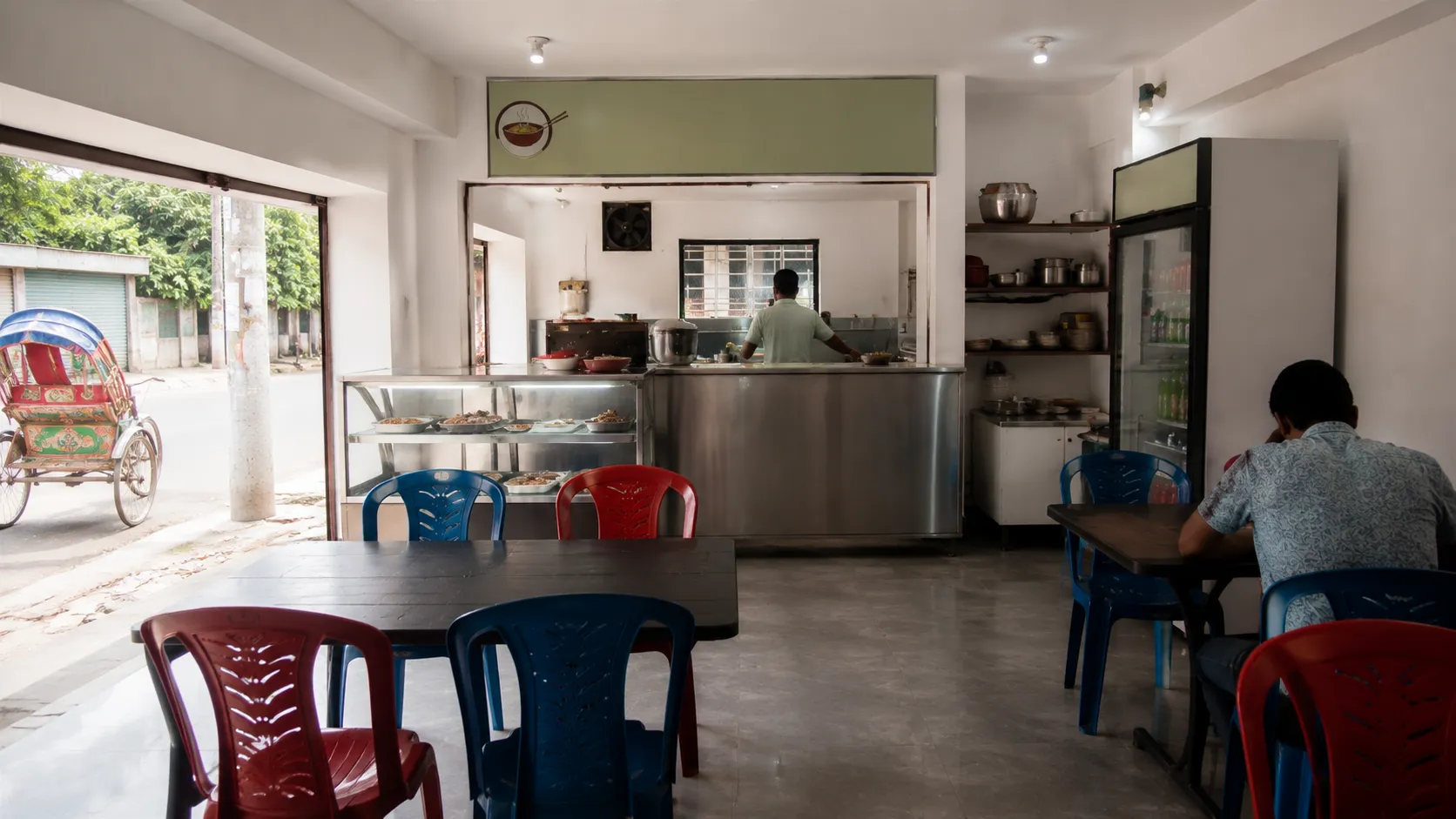 Example photo — the ground-floor restaurant at a shared housing facility